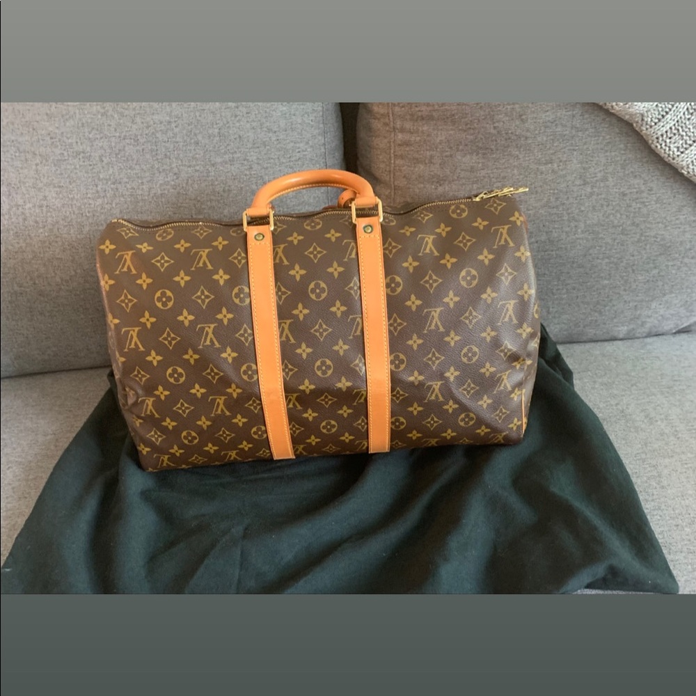 Preloved in EXCELLENT condition Louis Vuitton Keepall 45. No strap Authentic